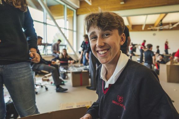 A student smiling during an academic class
