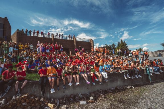 A crowd of students watching the eco challenge competition